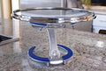trivae, lid holder, pot lid holder, inverted lid storage, inverted lid holder, lid stand, lid rest, pizza stand, cake stand, serving stand, display stand, kitchen tool, kitchen gadget, lid caddy, pot lid caddy